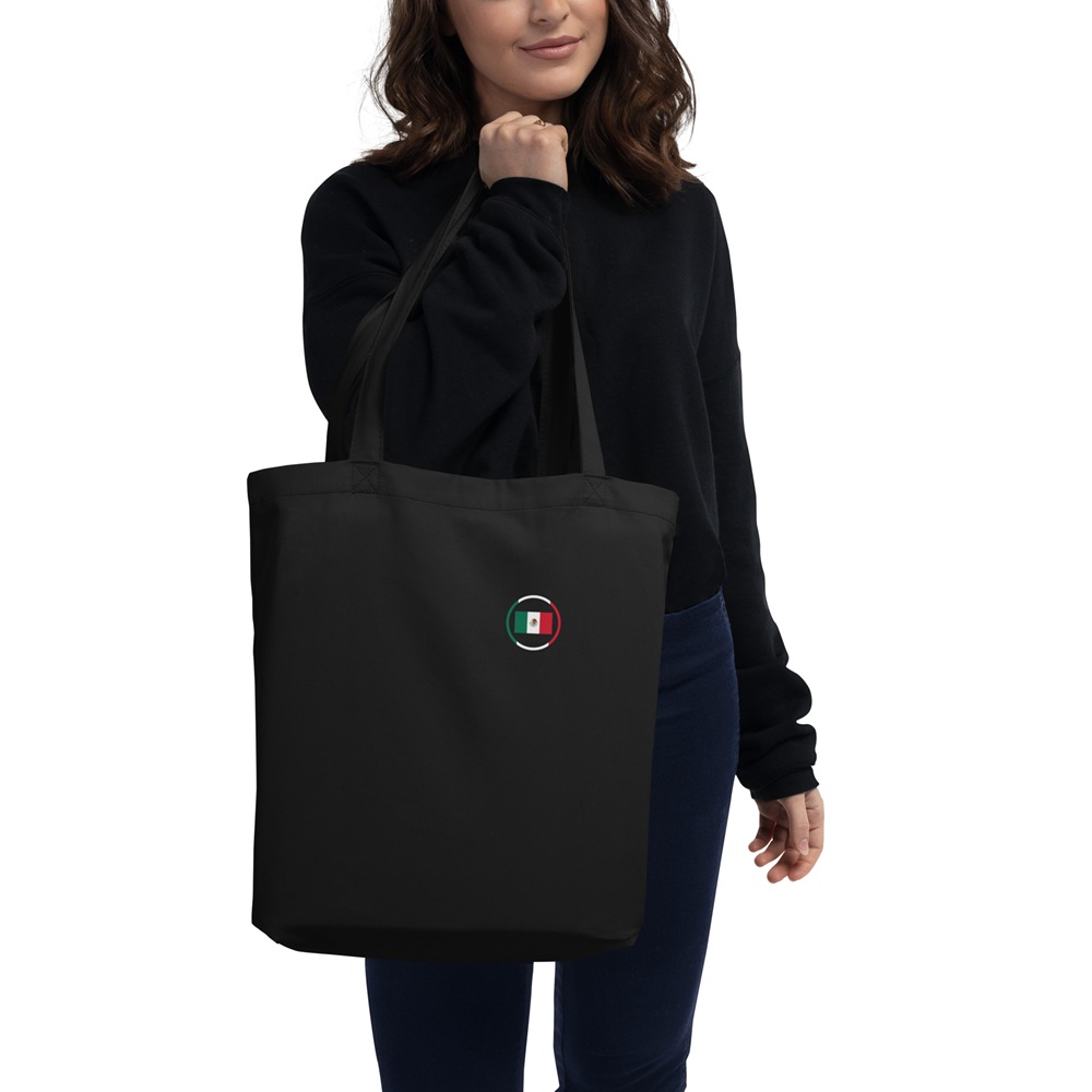 Tote bag noir avec design circulaire du drapeau mexicain Tote bag noir porté à l’épaule avec petit motif circulaire aux couleurs du Mexique